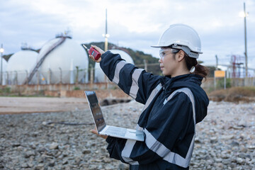 Engineer Monitoring Data at Natural gas plant