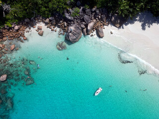 Anse Cocs beach, La Digue Seychelles, tropical beach during a luxury vacation in Seychelles. Tropical beach Anse Cocs beach, La Digue, Praslin, Mahe Seychelles with turqouse colored ocean