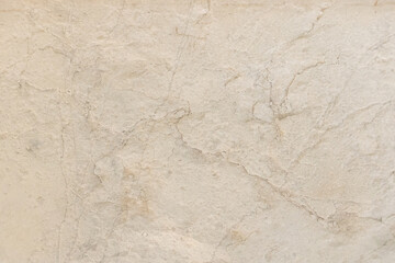 Beige natural marble with cracks as floor or wall surface, modern wallpaper, overlay, background for design or web banner