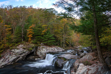 Majestic Baby Falls in East Tennessee showcasing vibrant autumn colors.i