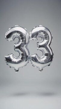 Silver balloon number 33 for birthday or anniversary party