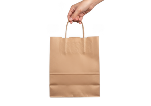 Stock photo of hand holding brown paper bag, shopping bag, retail bag, kraft bag, gift bag, grocery bag, packaging isolated on transparent background - Powered by Adobe