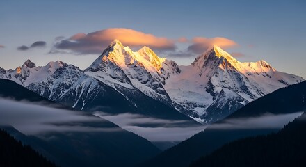 Majestic snow capped mountain peaks illuminated by golden sunlight against cloudy sky