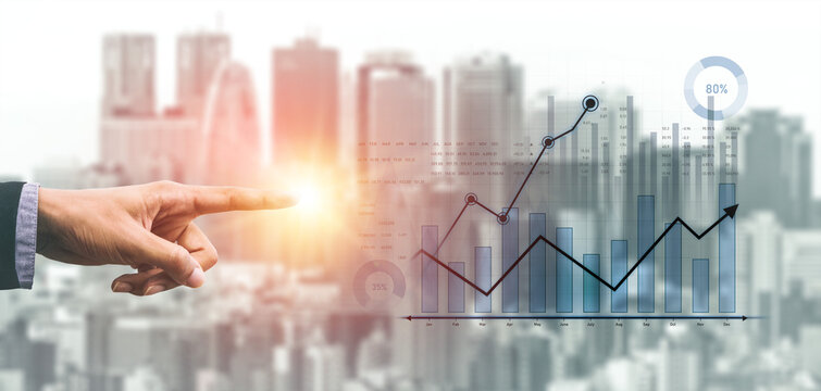 A close-up of a businessman hand pointing at modern graphs and charts showing financial growth, set against a blurred urban skyline, symbolizing success and advancements. Scalp