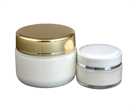 Two cosmetic jars with white cream. One jar has a gold lid, and the other has a silver band. Isolated on a transparent background for mockup use.