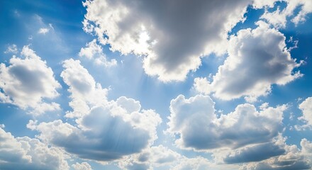 Bright Blue Sky Filled With Fluffy White Clouds on a Sunny Day