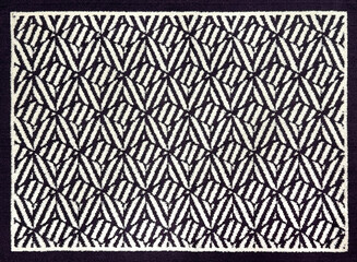 Obraz premium Close up of geometrical flower abstract pattern in black and white color, with border and frame. Suitable for graphic background, fabric, carpet, rug, and illustration. Seamless background texture.