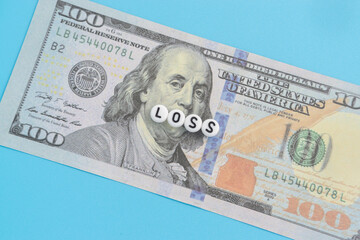 Dollar banknote with text Loss