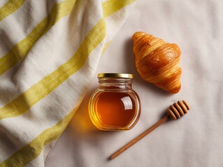 Enjoying fresh croissant with honey cozy kitchen food photography warm ambiance top view culinary delight