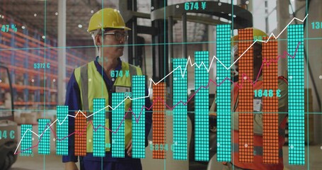 Inspecting two workers reviewing stock in warehouse with hard hats, hi-vis vests, digital charts