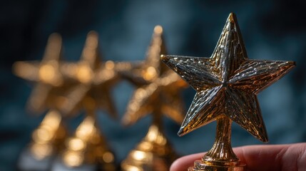 Close-up of golden star award trophy