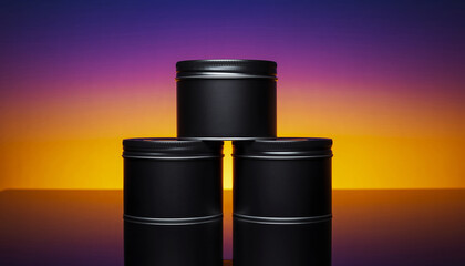 Three Black Metal Tins Stacked in Pyramid Formation Against Gradient Sunset Sky silver band