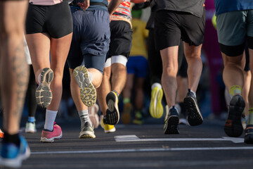 close up of runners feet competing in a marathon event in Ljubljana city street