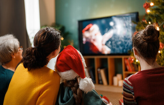 family watching holiday movies at home