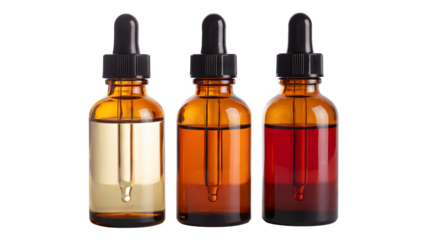 Three amber glass dropper bottles with various colored liquids showcase precise dosing for essential oils or serums