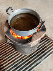 Boiling Water Pot on Traditional Charcoal Stove.