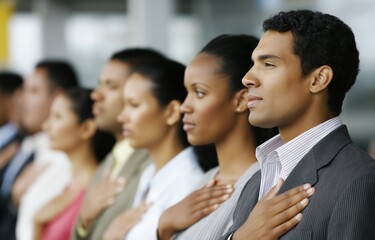 Eight diverse adults standing together, taking their citizenship oath with a sense of pride and unity