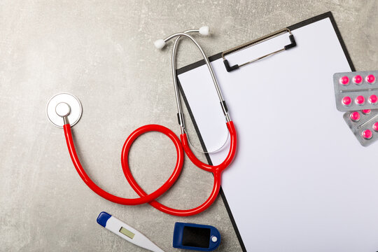 Stethoscope on the table. Medical instrument. Medical concept. Healthcare. Health Day.Doctor equipment. Cardiology. Heart disease.Lung diagnostics.Diagnosis of respiratory inflammation.Space for text - Powered by Adobe