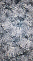 Shiny silver tinsel forming a sparkling christmas background texture perfect for holiday party invitations and festive decorations, decoration, abstract, wintertime