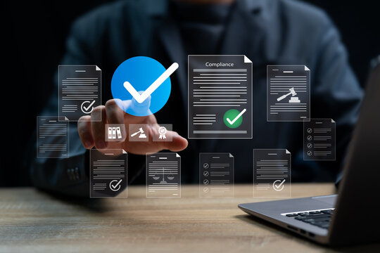 Compliance Management and Business Law Concept, Businessman using laptop to review legal regulations, document control, and internal financial audit system for corporate governance and transparency