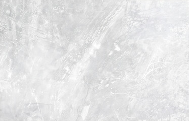 Smooth light gray concrete surface with natural imperfections and subtle cracks. Ideal as a minimalist background for architecture, industrial, or modern design projects.