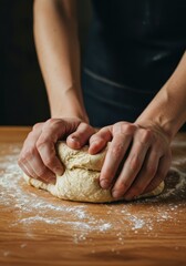 Close up shot of hands kneading rustic sourdough bread dough on a wooden surface, emphasizing the freshness and homemade quality of the baking process, activity, rising, domestic