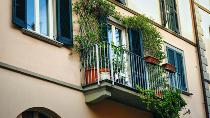 A typical Italian balcony in Milan reflects the city’s elegant architectural traditions