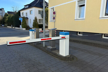 Parking barrier at a residential area in early afternoon