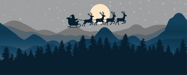 Silhouette of Santa Claus in his sleigh pulled by reindeer flying over a dark pine forest with mountains in the background under a starry night and full moon.