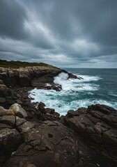 Obraz premium Dramatic panoramic view of a rugged, pristine coastline where powerful ocean waves crash against ancient stones, emphasizing wild natural beauty ,untouched ,vast ,coastline