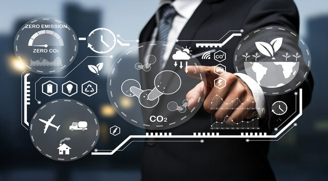 Business professional interacting with futuristic digital interface featuring environmental and sustainability concepts, graphs, and data analytics in urban setting - Powered by Adobe