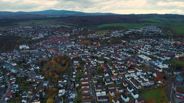Aerial panorama view of the old town around the city Idstein in Germany on a cloudy noon in fall	