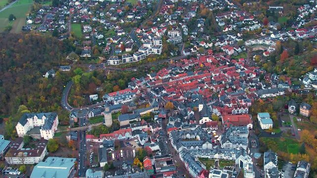 Aerial panorama view of the old town around the city Idstein in Germany on a cloudy noon in fall	