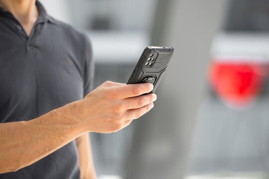 Happy business man with phone, social media concept