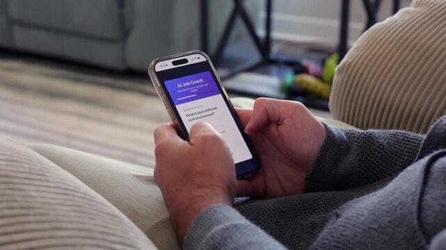 Middle Aged Man Using Artificial Intelligence Career Quiz Job Bot Mobile App - AI Job Coach Concept