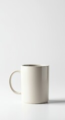 Fototapeta premium A clean ceramic coffee mug standing upright on a seamless pure white backdrop, ready for hot beverage consumption, design, porcelain, liquid