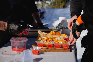 Preparing fried snacks for the table, red sauce for fast food