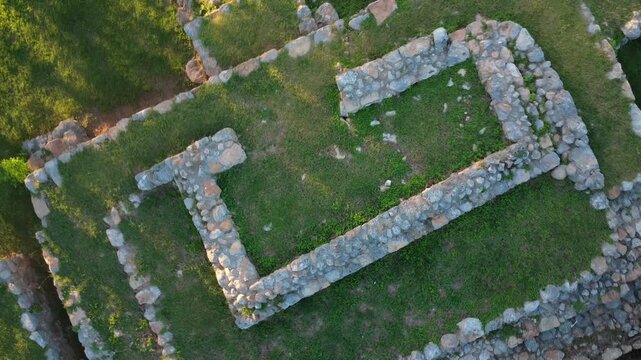 Aerial view of archaeological ruins surrounded by tropical vegetation at Fraccionamiento del Parque in M&eacute;rida, Yucat&aacute;n, Mexico