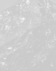 Close-up of Wrinkled Plastic Wrap, Transparent, Abstract Texture, Packaging Material, Environmental Waste