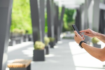 Happy business man with phone, social media concept