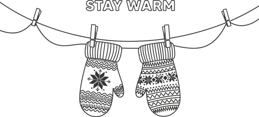 Two winter mittens hanging on a clothesline with the words stay warm above them