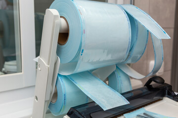 Rolls of blue transparent sterilization packaging material with indicators