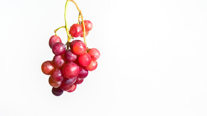 A Cluster of Ruby Grapes: A vibrant cluster of ripe, juicy grapes, a testament to the bounty of the...