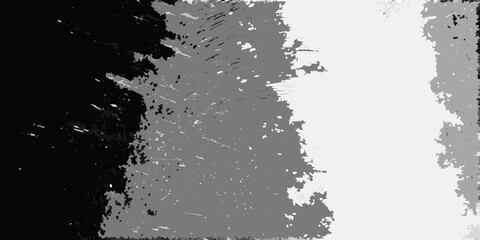 Abstract grayscale textured background with jagged edges and splatter effects