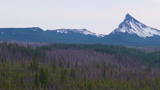 A commanding aerial view of the dramatically peaked Mount Thielsen, a distinctive former volcano, located in the Cascade Range near Crater Lake National Park in Southern Oregon