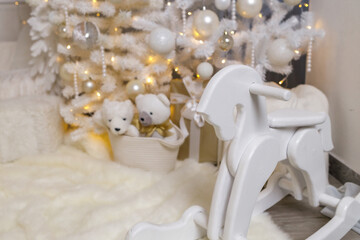 White Christmas Interior with Rocking Horse and Teddy Bear