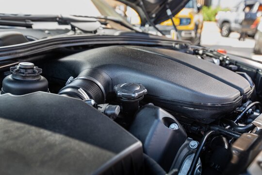 The vehicle open engine a car hood for safety test