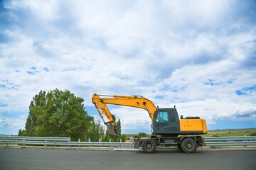 Construction crane equipment in construction on the road