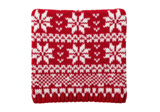 A cozy red knitted scarf adorned with white snowflake patterns, the intricate design evokes the warmth and charm of winter holidays isolated on transparent background
