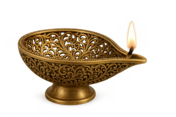 Ornate brass diya oil lamp illuminating diwali festival celebration and hindu spirituality with a burning flame on transparent background